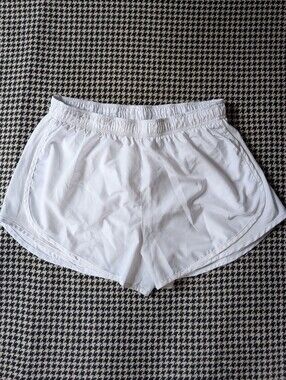 Nike white athletic running shorts with built in liner